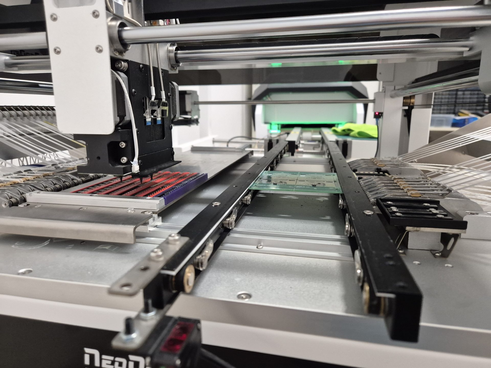 TinkerFab pick-and-place machine assembling a PCB